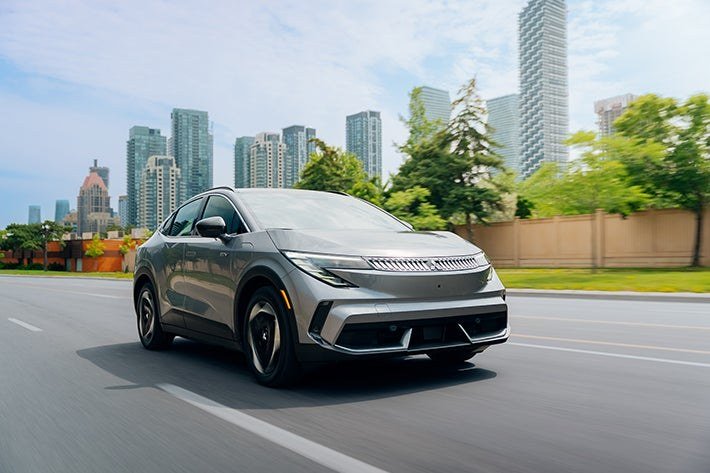 Mitsubishi Eclipse Sportback EV driving in the city