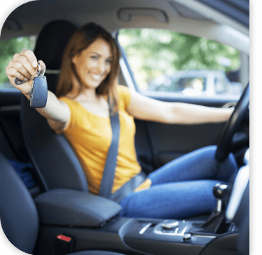 Customer receiving keys to a used vehicle