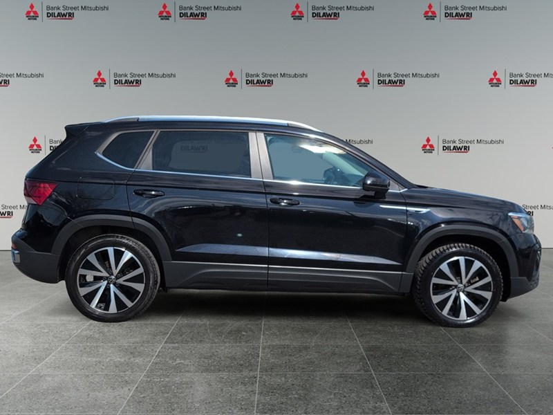 DEEP BLACK PEAR 2023 Volkswagen Taos Comfortline 4MOTION *Ltd Avail*